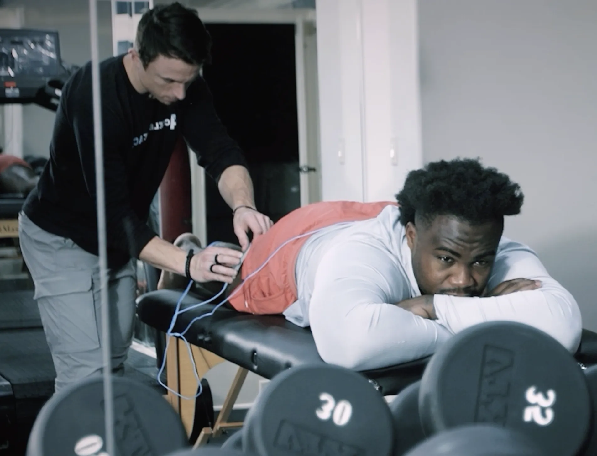 Grady Jarrett receiving Volta X neuromuscular stimulation during ACL recovery session